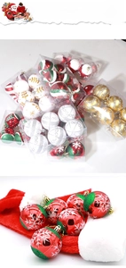 Macro shot of 6cm hand-painted Christmas tree balls in red, green and white festive patterns