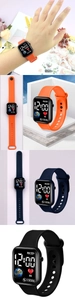 Detail of square LED display on digital sports watch showing heart rate and step counter