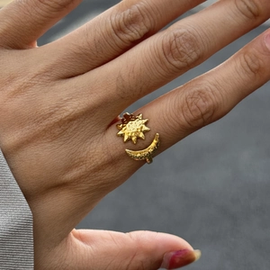 Detail of 18K gold plated hammered texture on adjustable sun and moon ring