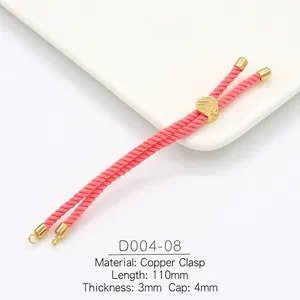 Macro view of 3mm pink braided cord with copper 18k gold-plated adjustable clasp detail