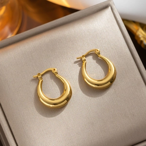 French vintage style gold hollow U-shaped stainless steel earrings in jewelry box