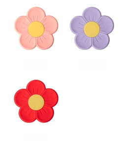 Detailed texture of cherry blossom silicone heat resistant placemats in multiple colors