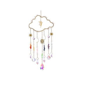 Detail of cloud-shaped suncatcher with fairy silhouette, colored crystals and moon pendant