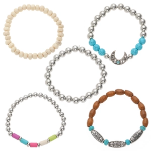 Detail of bohemian five-piece beaded bracelet set with turquoise and wooden beads