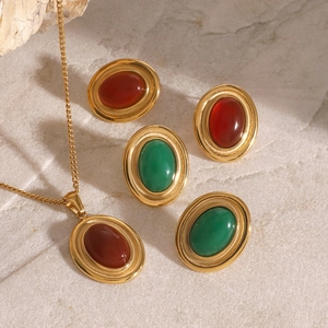 Vintage stainless steel jewelry set with red and green agate pendants and stud earrings