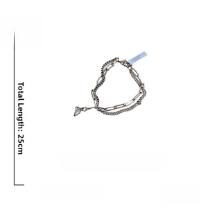 Detailed view of dual-layer stainless steel heart necklace with weight and length specs