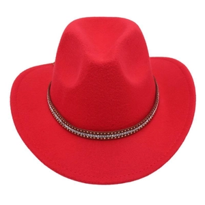Close-up of red felt cowboy hat featuring brown leather band with silver studs and rivets