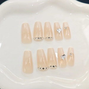 French style long trapezoid press-on nails with heart rhinestones and nude base