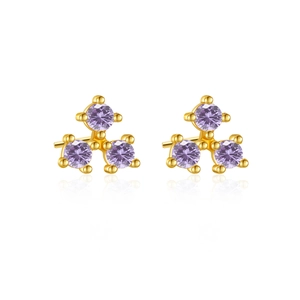 Detail view of gold-plated S925 silver stud earrings with three purple round-cut gemstones