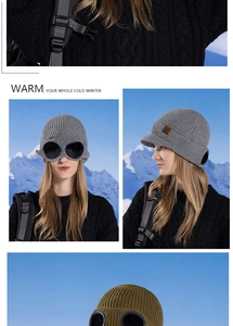 Detail of winter knit beanie featuring integrated black goggles and warm fleece lining