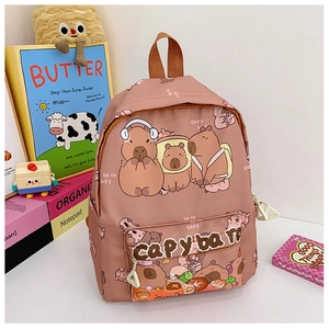 Detailed view of pink canvas backpack featuring cute cartoon capybara prints and zipper pocket