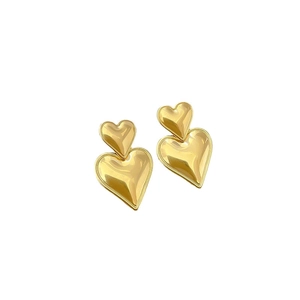 Minimalist double heart shaped gold titanium steel stud earrings with glossy mirror finish