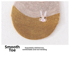 Macro detail of breathable knit fabric with cute rabbit embroidery and flat toe seam