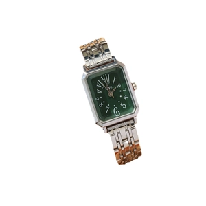 Elegant vintage rectangular silver steel watch with a deep green sunray dial for women