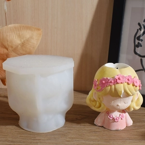 Detailed silicone mold and finished girl resin figurine with a pink flower wreath