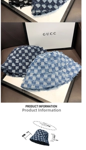 Detail view of denim checkerboard bucket hat with size measurements 56-58cm head circumference