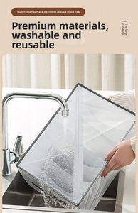 Close-up of waterproof mesh closet organizer being washed with water in a sink