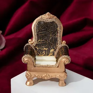 European vintage chair jewelry stand in champagne gold with black floral backrest