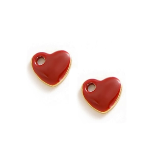 Detail of red enamel heart charms with gold metal edges for DIY jewelry making