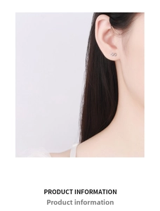 Detail of 925 sterling silver infinity screw back earring worn on earlobe by a model