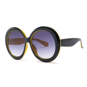 Oversized round sunglasses with black yellow frame and purple gradient lenses
