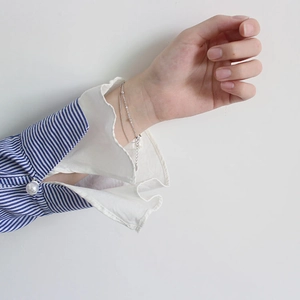 Minimalist S925 sterling silver double-layer snake bone bracelet on a woman wrist