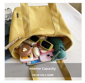 Top view of yellow canvas tote bag showcasing large internal capacity for daily items
