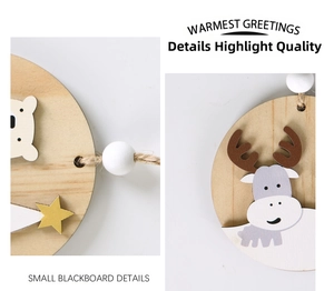 Detail of wooden Christmas ornament featuring laser-cut reindeer and white wooden beads