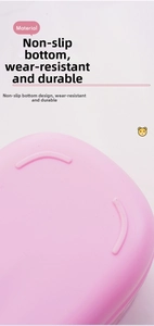 Detailed macro view of the pink plastic pencil holder bottom with non-slip curved ridges