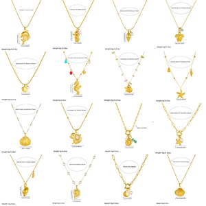 Gold plated stainless steel ocean necklaces set featuring starfish, shells and sea life