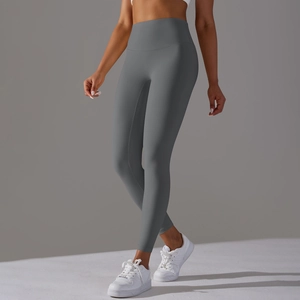 Close-up of charcoal grey high-waisted yoga pants with soft matte textured fabric