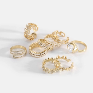 Set of 8 gold-plated rings with zircon leaf and pave designs for a layered fashion look