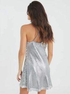 Back view of a sexy silver sequin mini dress with cross shoulder straps for women