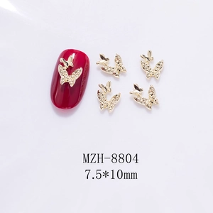 Detail of 3D gold butterfly nail art decor MZH-8804 with embossed metal texture
