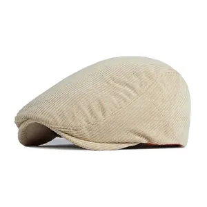 Classic beige corduroy flat cap featuring a retro design and structured casual fit