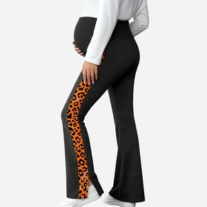 Detail of pregnancy flared pants with leopard side stripes and hem slit