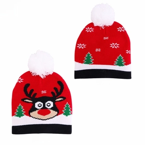 Detailed front and back views of a festive Christmas knit hat with reindeer and pompom