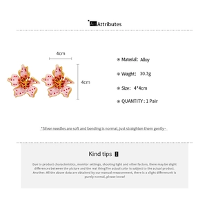 Detail showing pink enamel flower earrings dimensions of 4cm by 4cm with silver pins