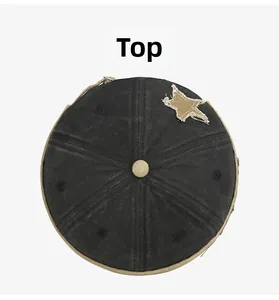 Top view of vintage washed black denim docker hat with khaki star patch and top button