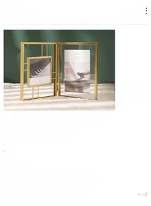 Detail view of a 4x6in gold metal folding photo frame with transparent glass panels