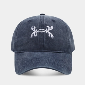 Unisex washed cotton baseball dad hat with white antler embroidery in dark navy blue