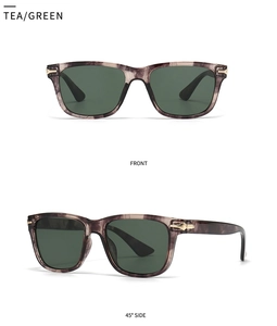 Detail view of round tea marble sunglasses with dark green lenses and gold hinges