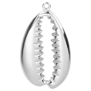 Macro detail of a silver-toned cowrie shell charm pendant with a polished metal finish