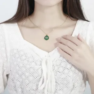 Gold stainless steel Aquarius zodiac necklace with green malachite enamel pendant