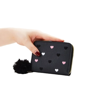 Mini black faux leather wallet with colorful heart embroidery and plush fur pompom charm