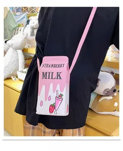Back view of a person wearing a creative pink strawberry milk box crossbody bag