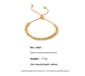 Detail of 4mm gold beaded stainless steel bracelet with adjustable bolo clasp design