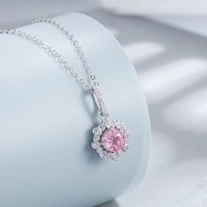 Elegant 925 silver necklace with 6mm pink ice flower cut stone in floral pavé setting
