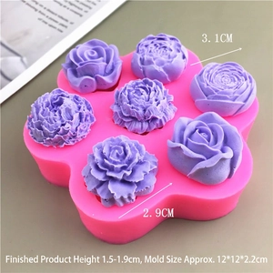 Pink silicone mold for rose and peony fondant cake decorations with sizing metrics