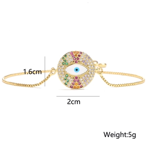 Detailed view of evil eye gold bracelet with dimensions 1.6cm x 2cm and weight 5g